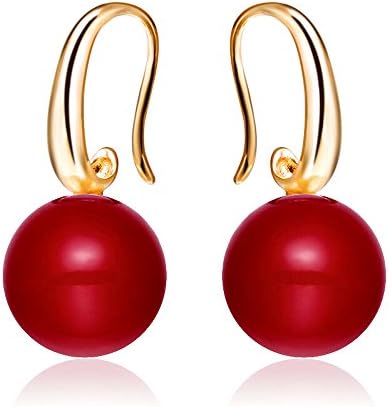 We hang smooth twelve millimeter simulated pearls from curved ear wires for an easy drop.